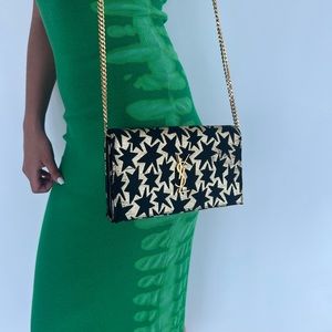 Saint Laurent Classic Monogram Wallet on Chain
Printed Fabric Medium